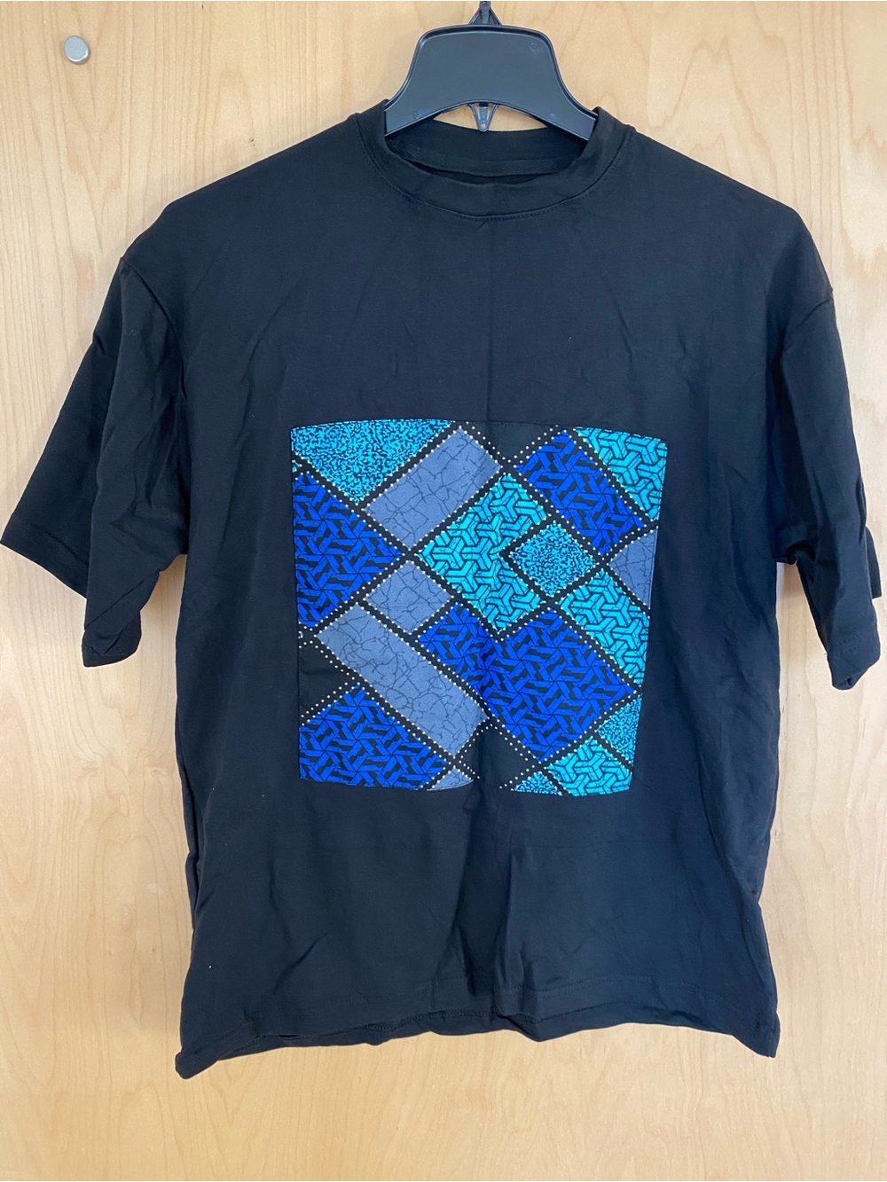 Black Unisex Graphic Tee with Blue African print Patchwork Design